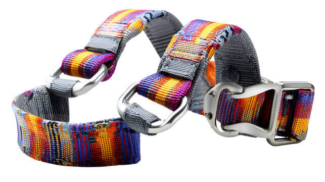 Colorful modern rock climbing harness with silver buckles with harness multicolored straps clips white background vibrant rock silver metal with protection