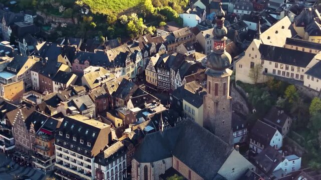 Aerial view around the city and old town of Cochem in Germany Rhineland-Palatinate on a sunny spring afternoon beside the mosel river 