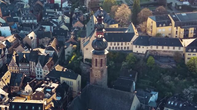 Aerial view around the city and old town of Cochem in Germany Rhineland-Palatinate on a sunny spring afternoon beside the mosel river 