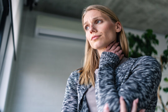Woman experiencing emotional overwhelm and anxiety. Mental health awareness, depression, emotional wellbeing, therapy, recovery and psychological support concept.