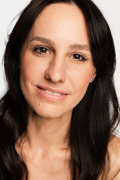 Woman smiling with natural beauty headshot portrait
