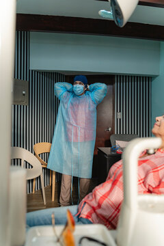 Dentist preparing to receive his patient at the clinic.