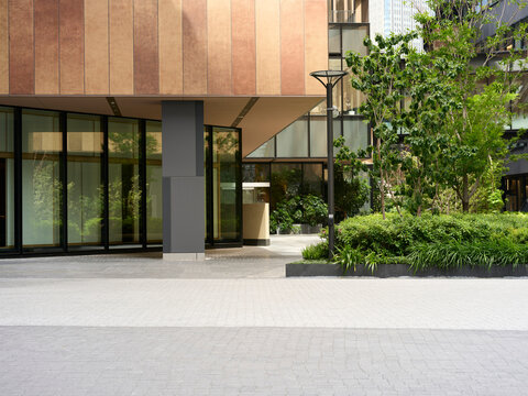 Building Entrance With Green Plants in a Modern City Setting, Osaka