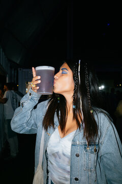 Young Woman Enjoying Refreshment
