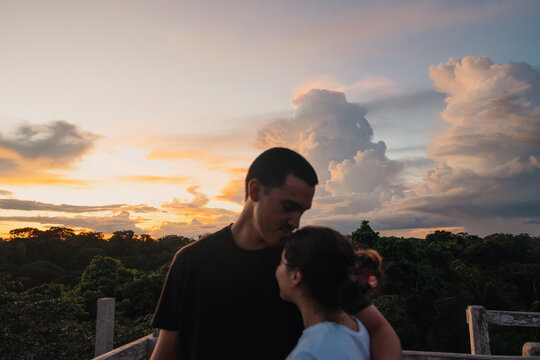 Couple Enjoys Sunset View From Canopy Tower in Peruvian Amazon