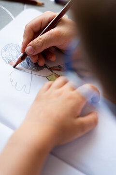 Child Coloring Drawing in Sketchbook