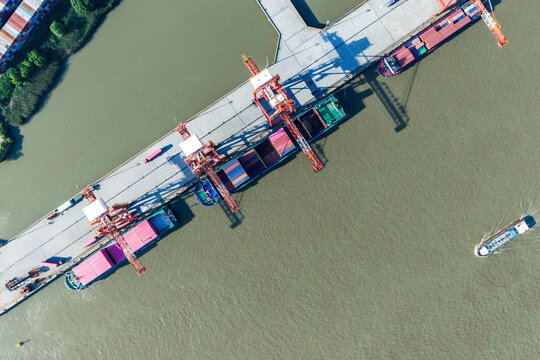 cargo port with cranes loading container ships