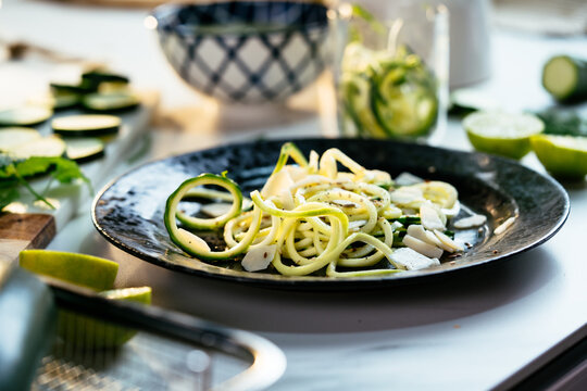Healthy zucchini spiraling into delicious low carb zoodles