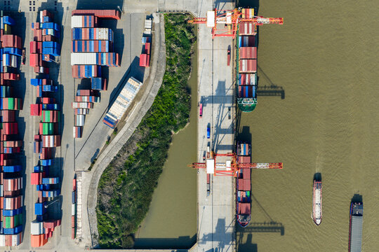 cargo port with cranes loading container ships