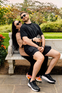 A young couple out for a walk in the park