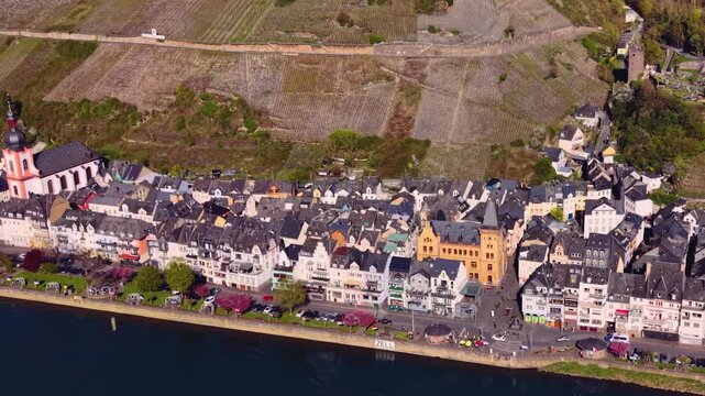 Aerial view of the city and old town above Zell beside the river Mosel in Germany on a sunny spring day
