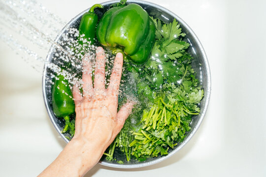 Rinsing Vegetable Kitchen Sink