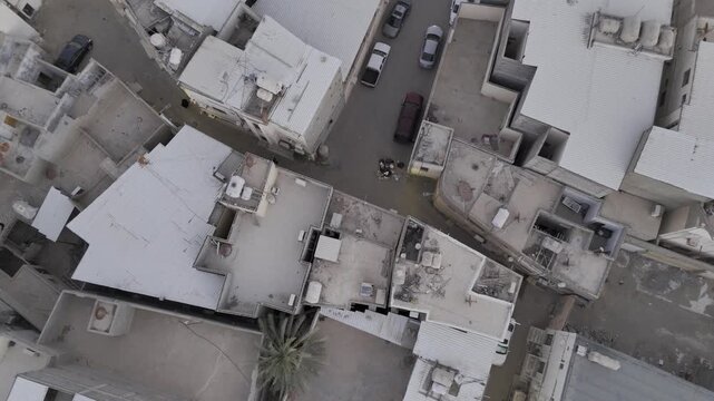 Top Down Aerial View of Traditional Saudi Homes and Oasis
