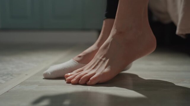 Gentle cloth caress on toes and fingers. Closeup of damp fabric wiping toes and fingers joyfully. Calm intimate scene capturing damp cloth caressing toes and fingers joyfully in slow motion