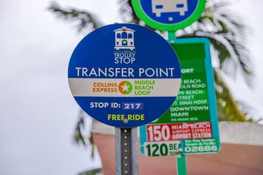 Close-up view of Miami Beach Trolley transfer point sign for Collins Express and Middle Beach Loop. Miami Beach. USA. 