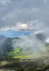 Naklejka premium Misty Mountain Valley with Clouds and Sunlight Over Fraser Valley Chilliwack British Columbia Canada