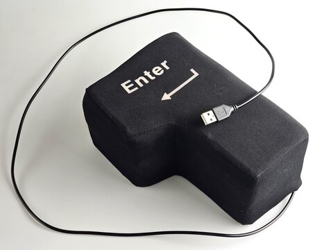 Oversized USB Enter Button with Plug Resting on Soft Key
