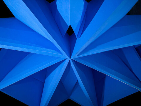 Paper origami star geometry structure. Vertex symmetry center pattern presentation backdrop. Concept design layout element model. Shadow light polygon intersection construction industry space artwork.
