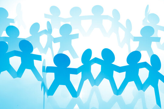 Team holding hands united