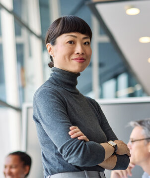 Group of young business people having a meeting or presentation and seminar in the office. Portrait of a young businesswoman
