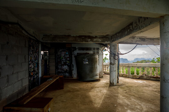 Aged stone pavilion terrace on a cliff side at Wat Tham Suea in Krabi, Thailand