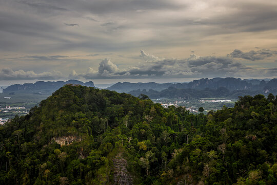 Aerial panoramic view of limestone mountain peaks and tropical rainforest in Krabi province, Thailand