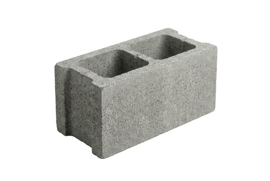 Single grey concrete block isolated on black background