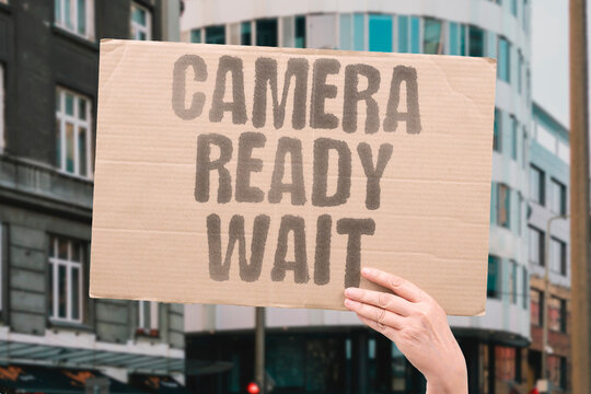 "Camera ready wait" The group photo freezes while someone is unprepared. PHOTO. GROUP. UNREADY. AWKWARD. SMILE.