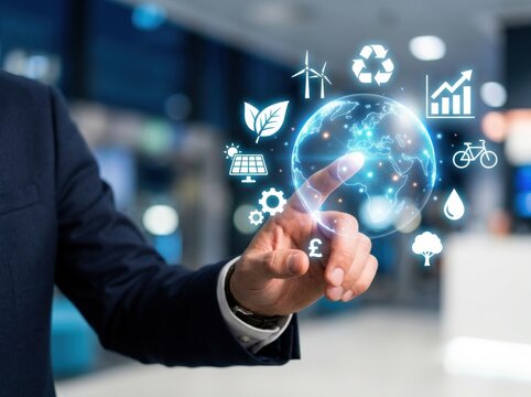 A business professional interacting with a digital globe interface featuring various glowing environmental icons representing sustainability and green energy technology