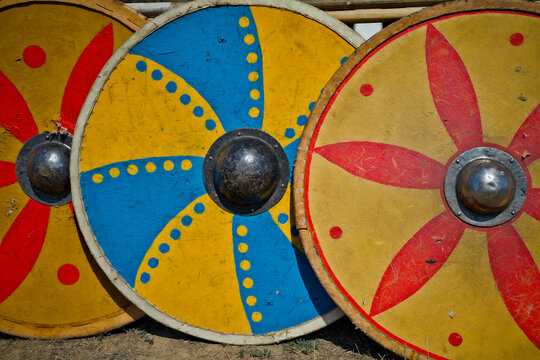 Detail Close Up of Hand Painted Medieval Wooden Round Shields