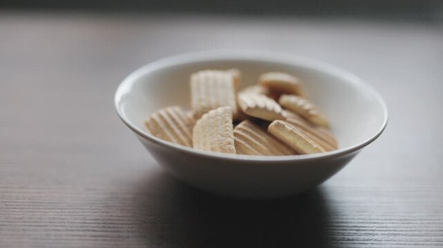 Close-up of homemade baby biscuits served in white bowl