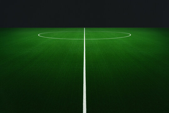 Big textured soccer game field with copy space - center, midfield. Real image with an isolated background.