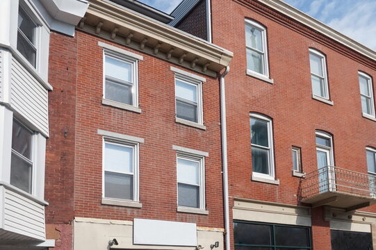 Three Adjacent Brick Row Homes and Shops