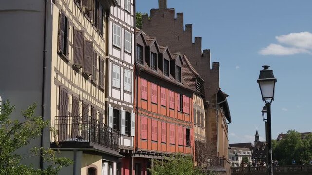 Colorful half timbered buildings reflecting on the Ill river in the Petite France district of Strasbourg
