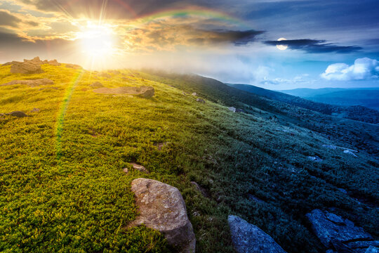 nature scenery with mountain under summer sky. day meet night. sun and moon over alpine landscape of carpathian mountain with grassy slopes. low fluffy clouds on high altitude. summer vacations