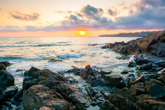 sea landscape at sunrise. rocky coast of bulgaria in summer. dramatic travel background with epic sky