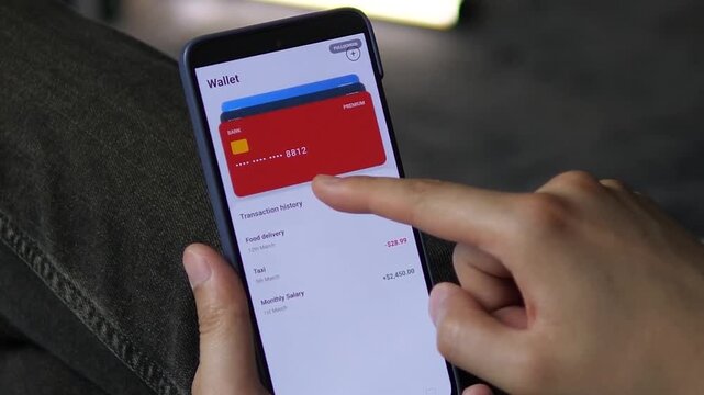 Seamless mobile banking interface for card management. A user interacts with a stack of cards blue, red, and dark within a digital wallet. Ideal for app design portfolios, fintech demos