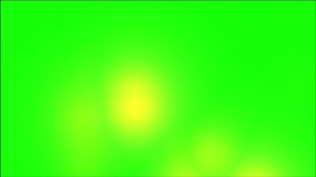 Vibrant lime green background with shifting soft yellow light orbs in motion video footage design