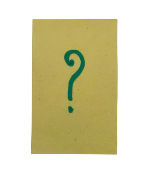 Green question mark symbol printed on a textured beige cardboard paper isolated on transparent background
