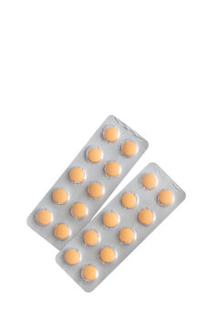 Orange tablets in blister packs isolated on transparent background, png