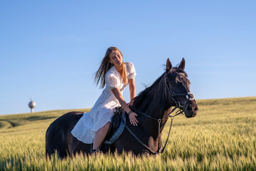 Beautiful woman wtih horse in coutriside © muro