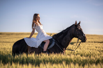 Beautiful woman wtih horse in coutriside © muro