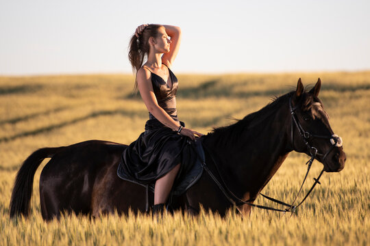 Beautiful woman wtih horse in coutriside