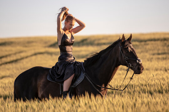 Beautiful woman wtih horse in coutriside