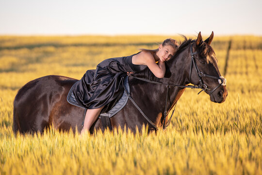 Beautiful woman wtih horse in coutriside