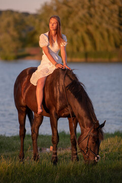 Beautiful woman wtih horse in coutriside