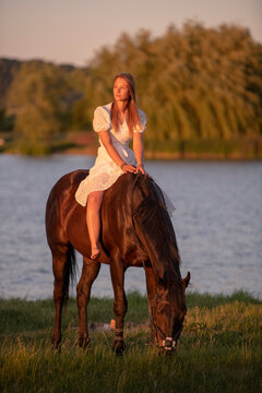 Beautiful woman wtih horse in coutriside