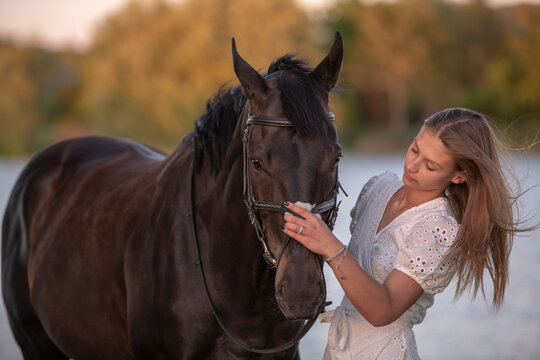 Beautiful woman wtih horse in coutriside
