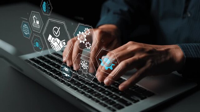 Hands Typing on Laptop with Digital Icons Representing Technology, Data, Business, and Innovation in Dark Environment. Entropy.