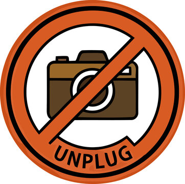 A circular orange sign featuring a camera icon with a diagonal line and the word unplug written below